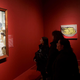 Museum-goers look at Norman Rockwell’s Freedom From Want, aka The Thanksgiving Picture
